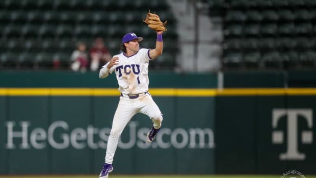 Peyton Chatagnier leaps up to keep the ball in the infield.